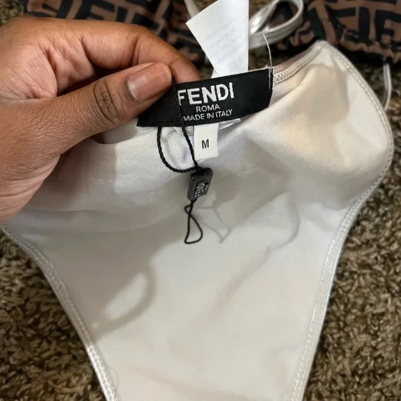 NEVER WORN FENDI SWIM SUIT.